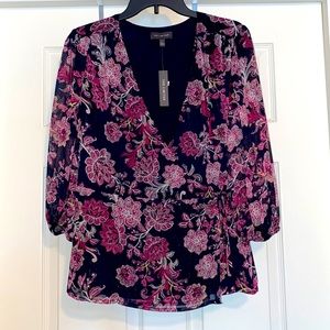Navy and fuchsia wrap tie-front blouse